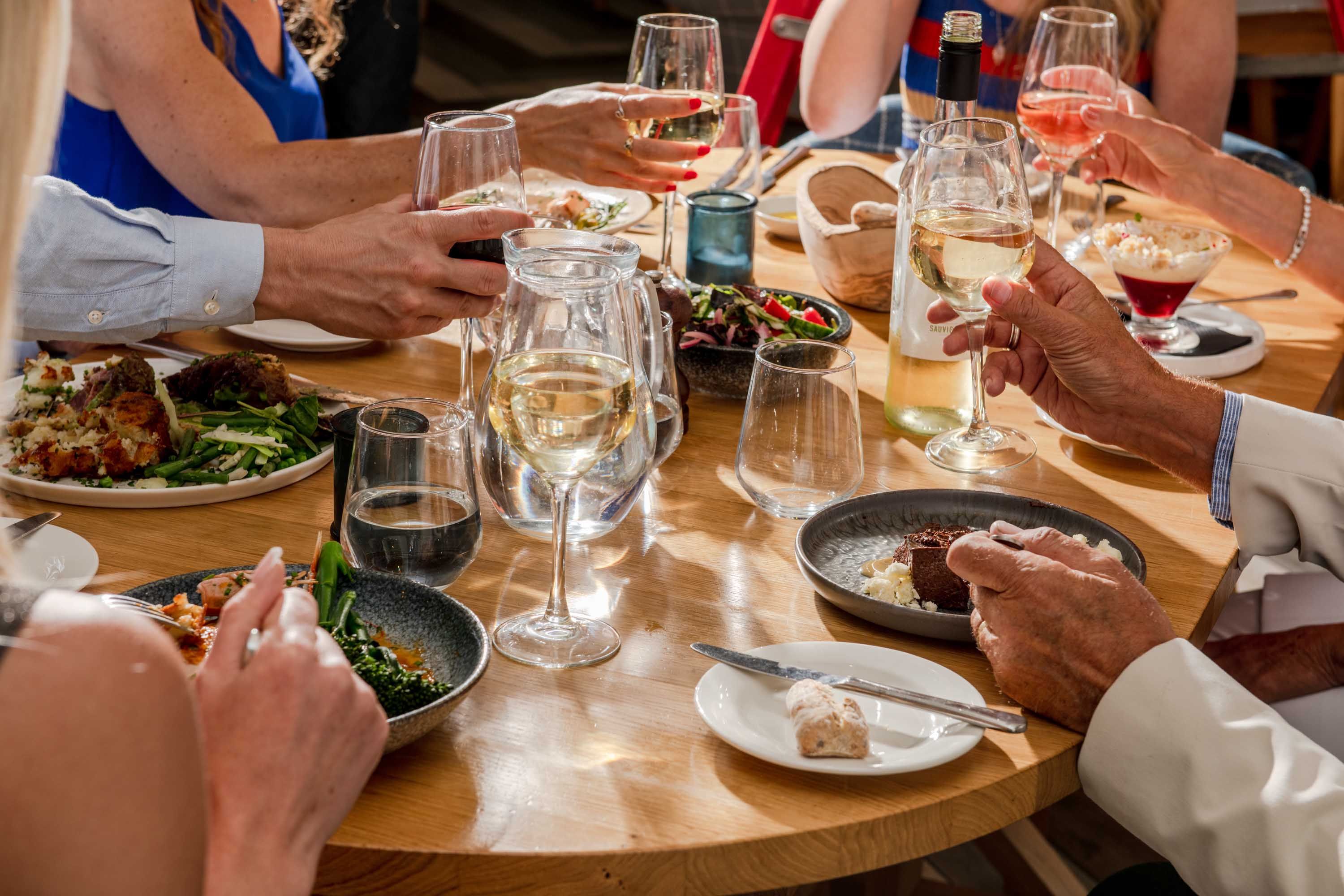 Group enjoying meal at table